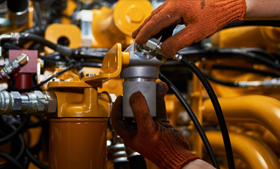 hydraulic pipes maintenance on heavy industry machine.