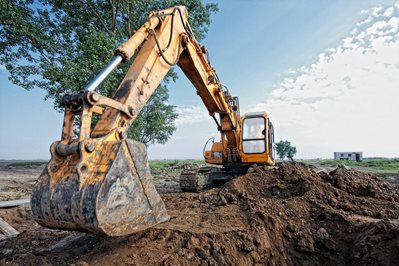 excavator digging a trench for the pipeline excavator digging a trench for the pipeline