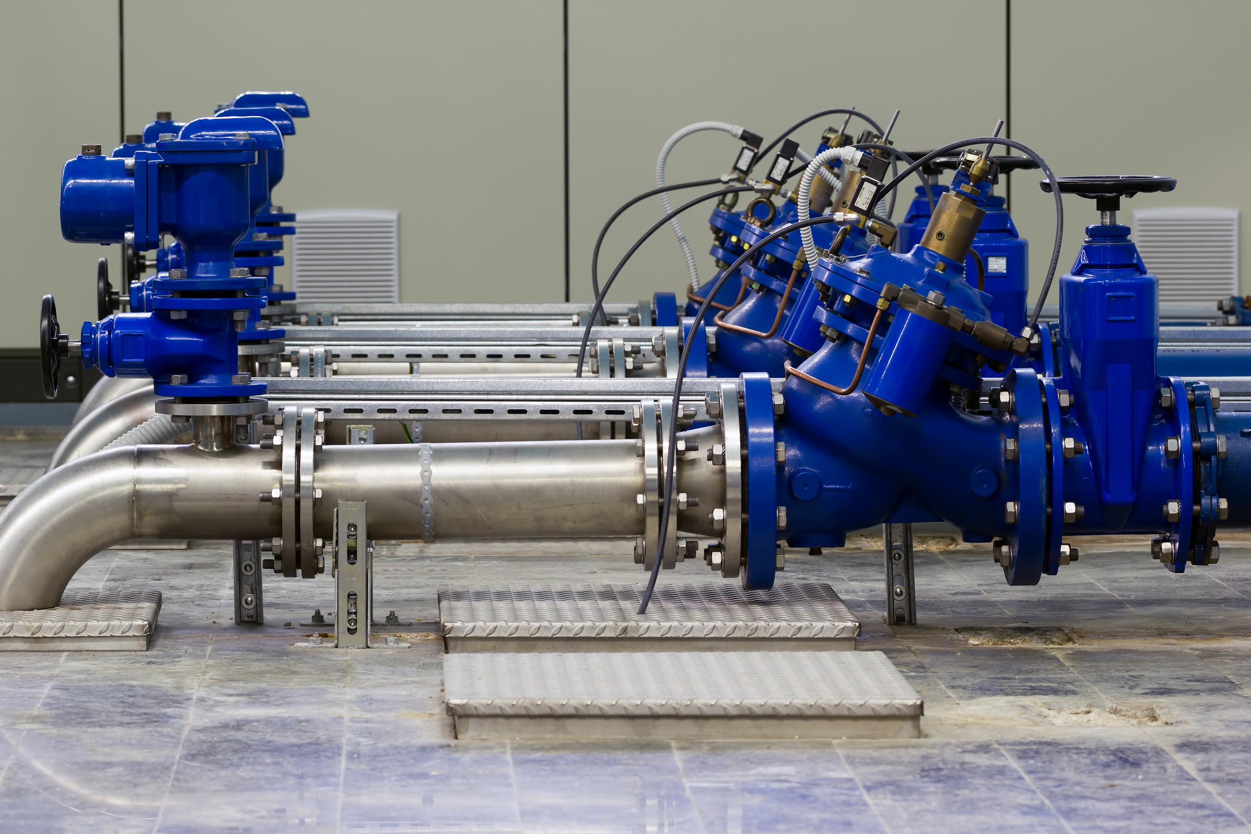 Water pumping station with booster pumps and valves
