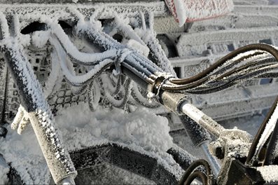 Close-up Frozen hydraulic pipes of a Ratrack machine